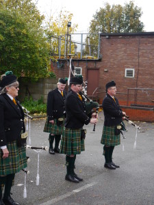 Joel Grigg playing for the wreath laying
